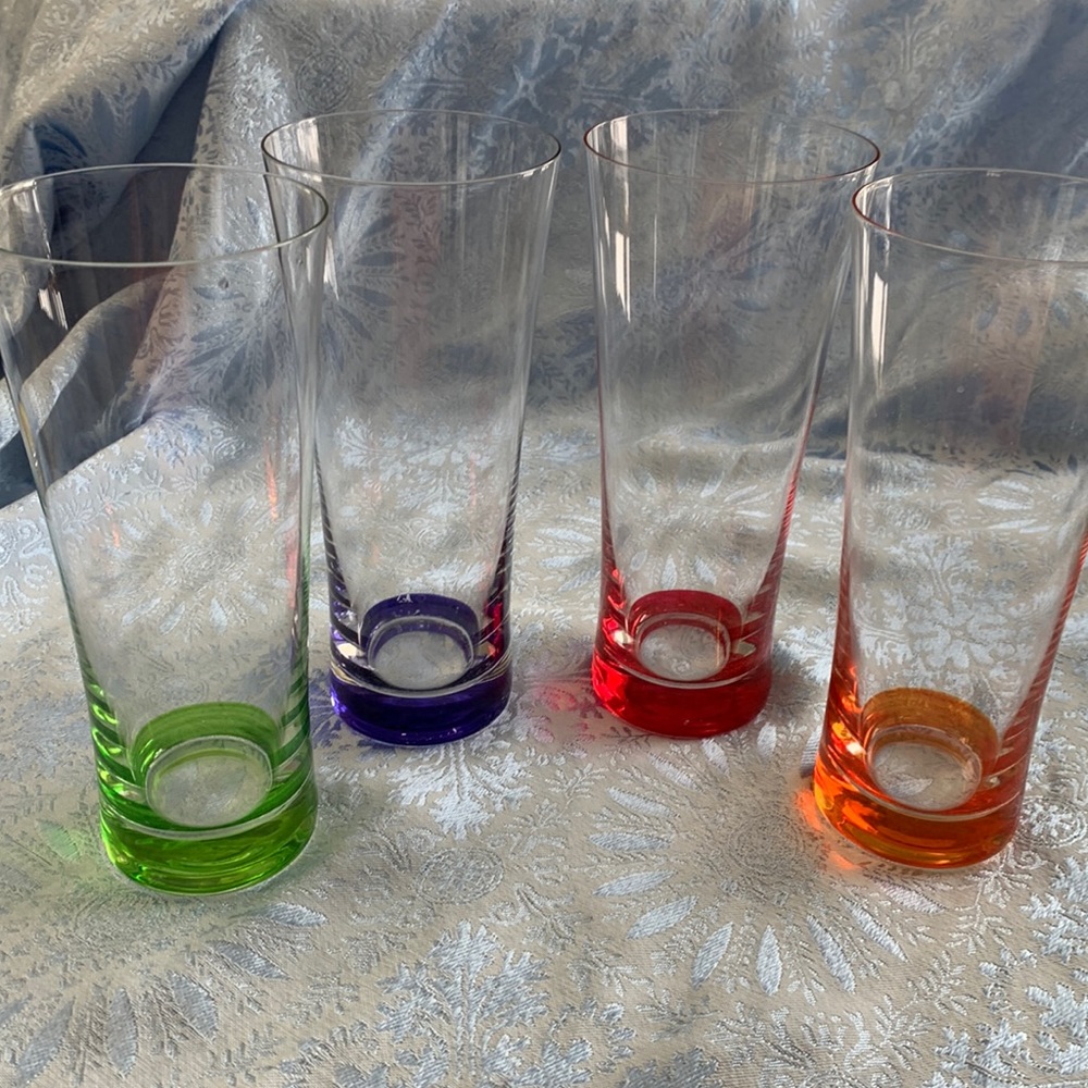 Set a four colorful drinking glasses